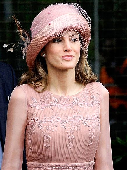 Chic in her hat.