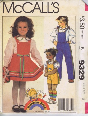 9329 McCalls Girls Dress Overalls Blouse Sewing Pattern Size 2 Bust 21 Inches Uncut McCall's 9329, features a jumper dress, overalls and blouse sewing pattern for toddler girls in size 2 with a 21 inch bust along with an applique, the pattern is uncut.